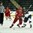 GRAND FORKS, NORTH DAKOTA - APRIL 14: Denmark's Joachim Blichfeldt #21 battles the Slovakian player for the puck during preliminary round action at the 2016 IIHF Ice Hockey U18 World Championship. (Photo by Minas Panagiotakis/HHOF-IIHF Images)

